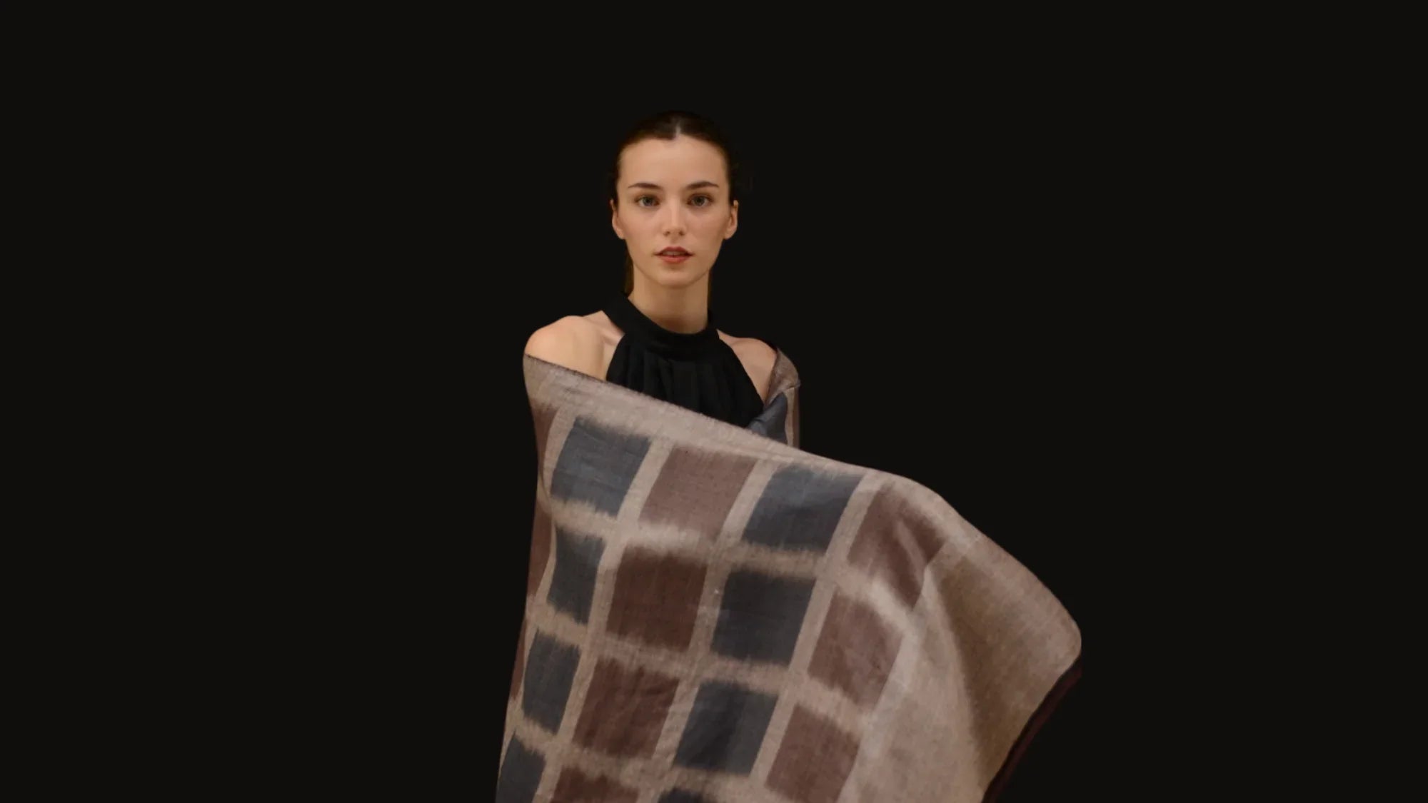 Model drapped indusweavers ikat pashmina on full upper body 