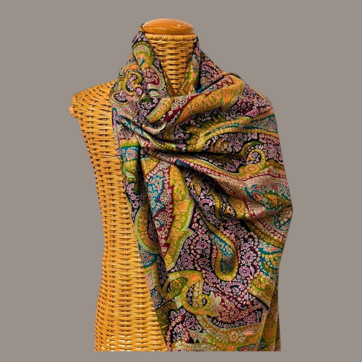 Indus Weavers Floriana Pashmina shawl featuring intricate Kalamkari painting and Sozni embroidery in green and maroon.