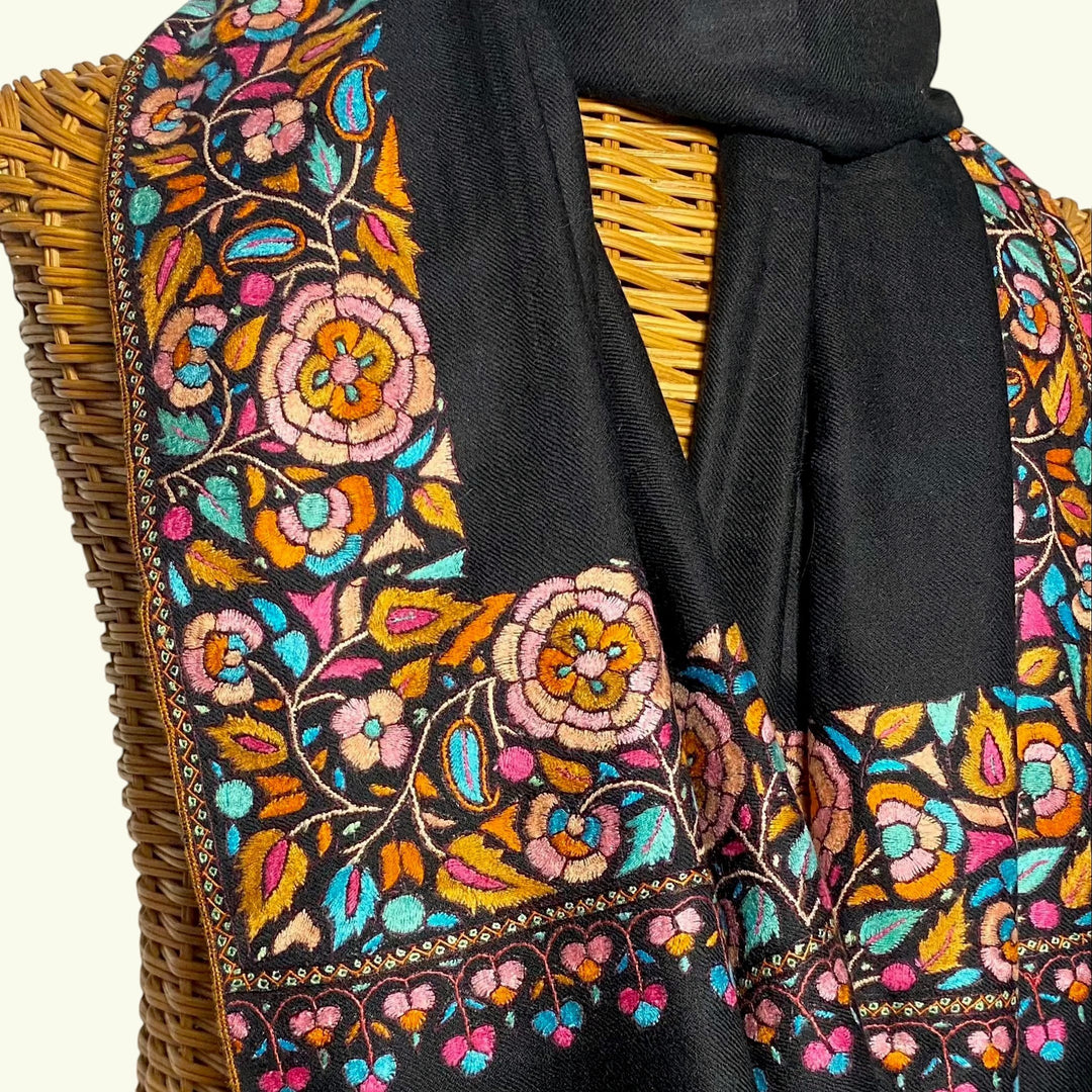 KAYA Handwoven Black Pashmina Shawl – Draped on Mannequin Showing Bright Floral Papier Mâché Embroidered Borders | Indus Weavers