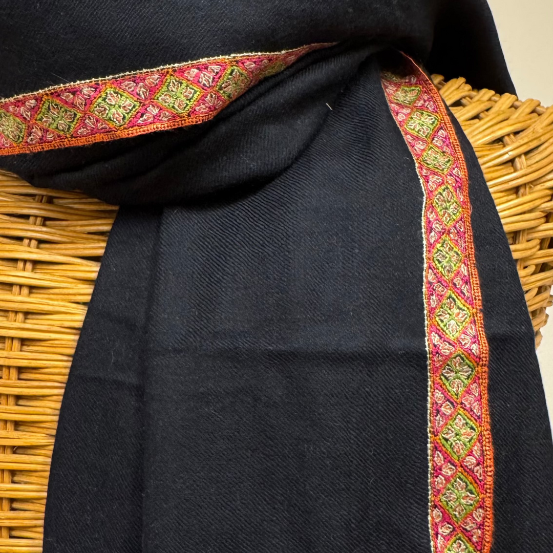 Elegant black Pashmina shawl with traditional Sozni embroidery along the border.