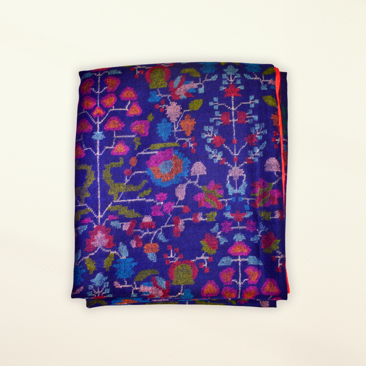 Folded Pashmina Shawl with colorful floral pattern on a white background