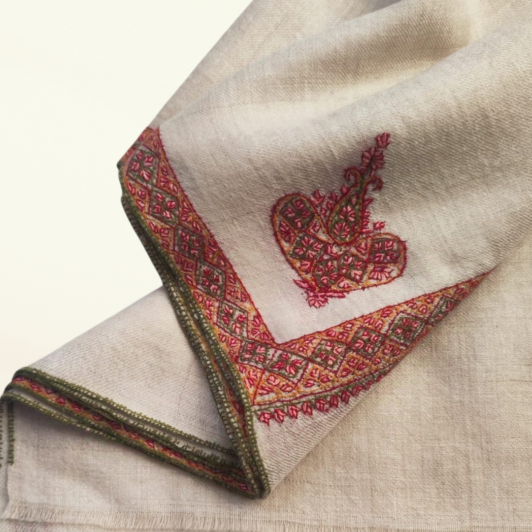Embroidered pashmina shawl with a design on a beige background