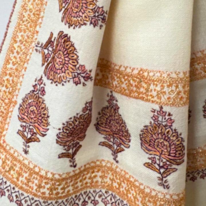 Ivory Pashmina shawl with traditional gold Tilla zari embroidery along all four borders.