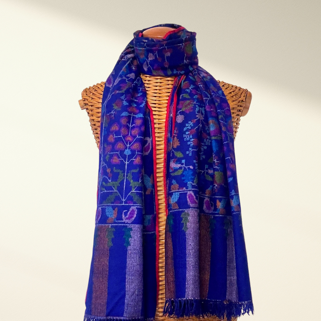 Kani Pashmina Shawl with intricate patterns draped over a mannequin on a plain background