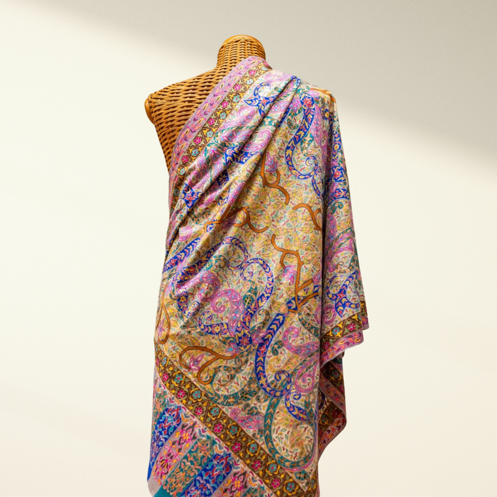 Kashmiri Pashmina Shawl draped over a mannequin on a plain background