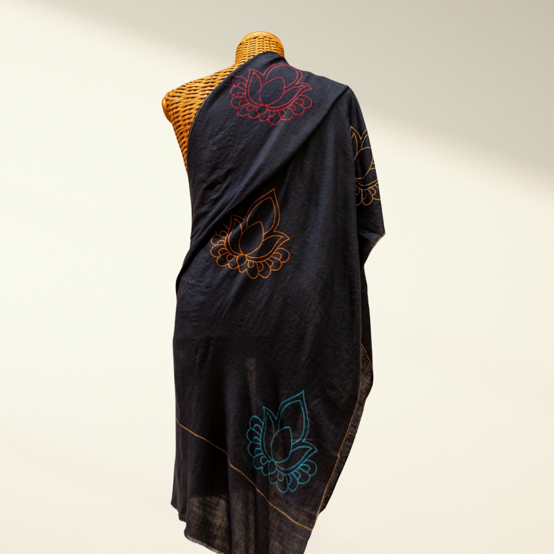 Lotus pashmina scarf with embroidered lotus designs on a neutral background