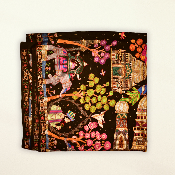 Pashmina Shawl Darbar with colorful elephant design on a white background