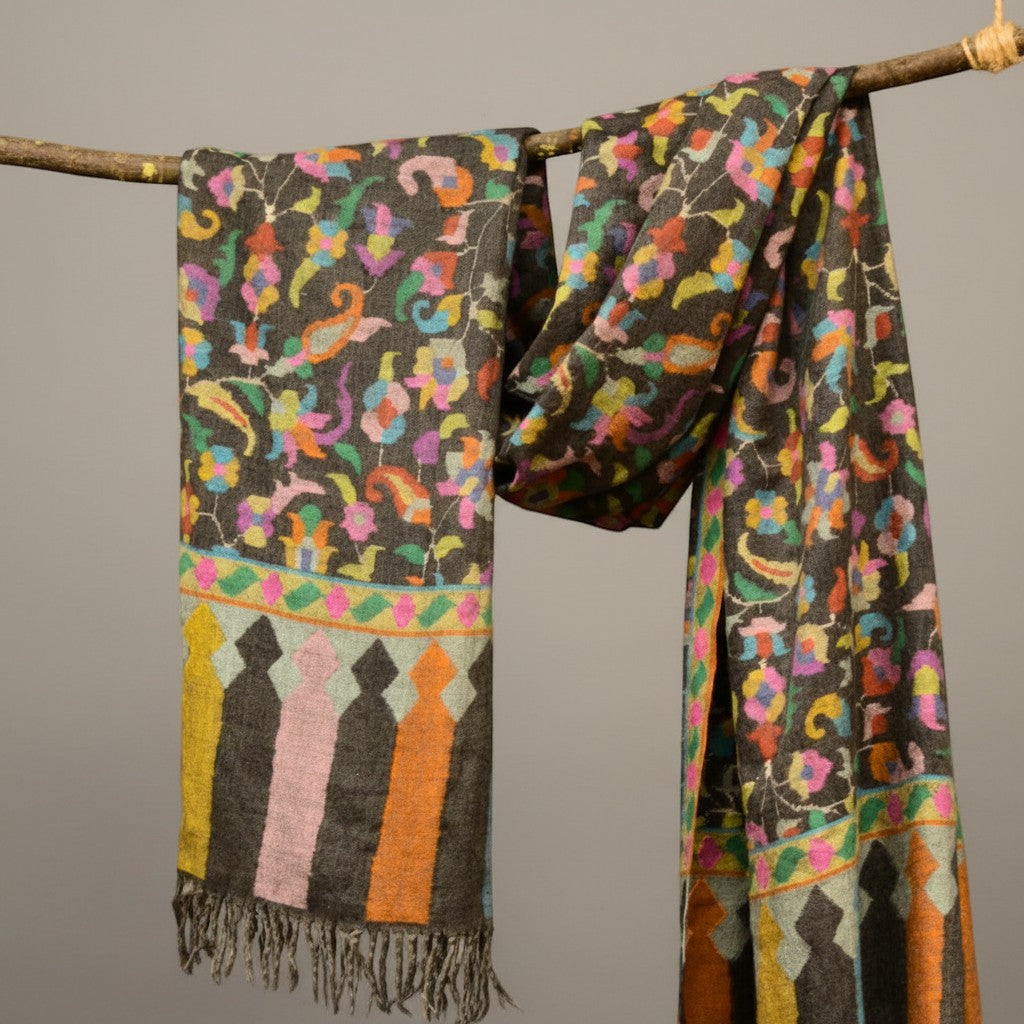 KARINA Kashmiri Kani Pashmina Shawl – Lifestyle Draped on Rustic Branch Showing Full Multicolour Kani Pattern | Indus Weavers