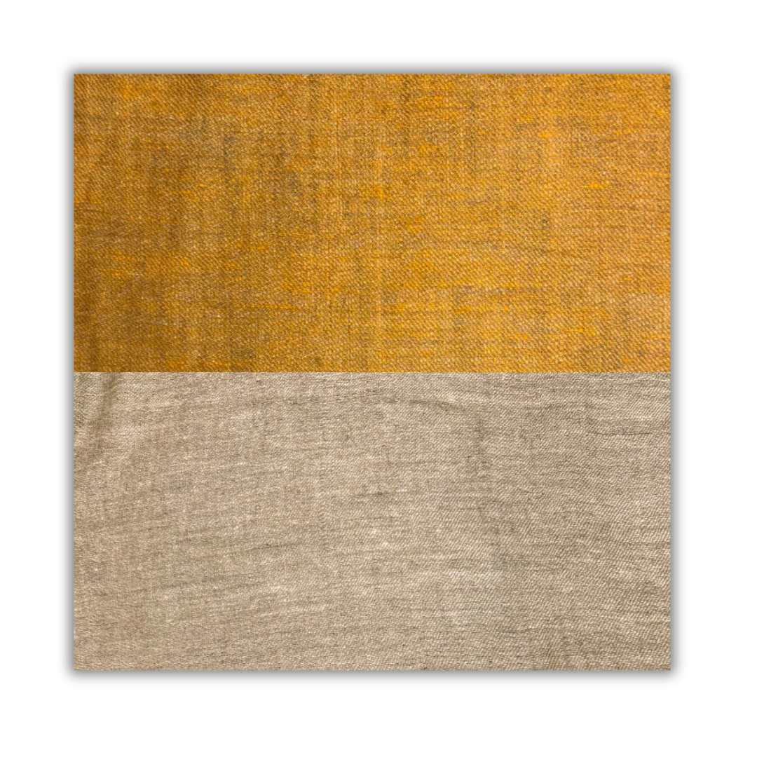 Two-tone pashmina swatch with mustard yellow and beige colors on a white background