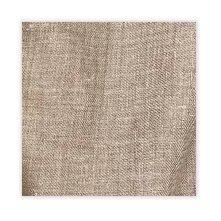 Textured beige pashmina on a white background