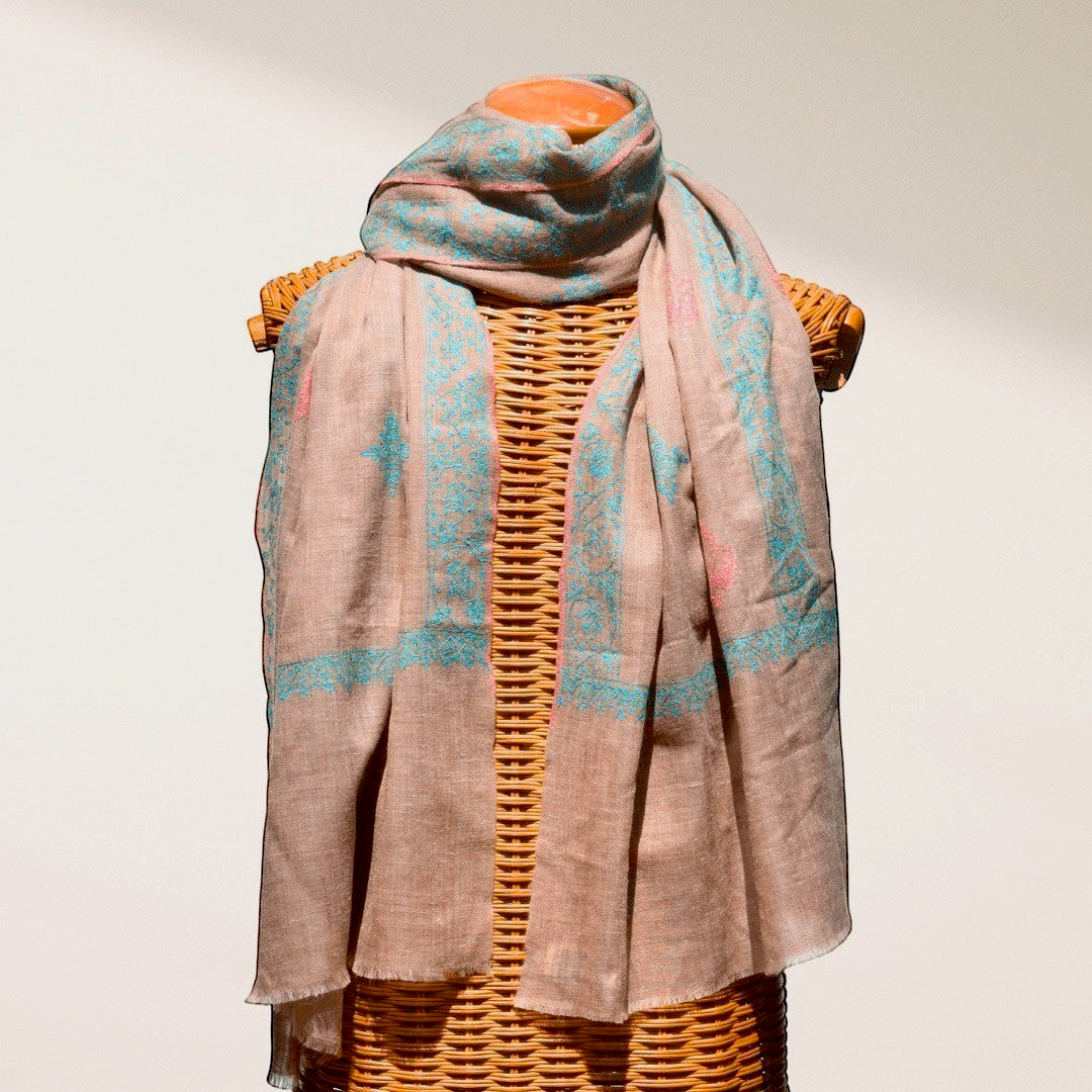 BLISS Pure Pashmina Shawl – Draped View of Natural Taupe Undyed Cashmere with Pink & Blue Sozni Embroidered Corners | Indus Weavers