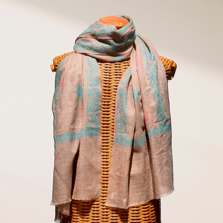 BLISS Pure Pashmina Shawl – Draped View of Natural Taupe Undyed Cashmere with Pink & Blue Sozni Embroidered Corners | Indus Weavers