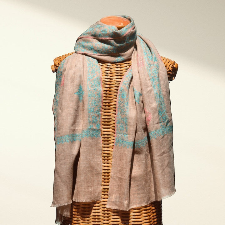 BLISS Pure Pashmina Shawl – Draped View of Natural Taupe Undyed Cashmere with Pink & Blue Sozni Embroidered Corners | Indus Weavers