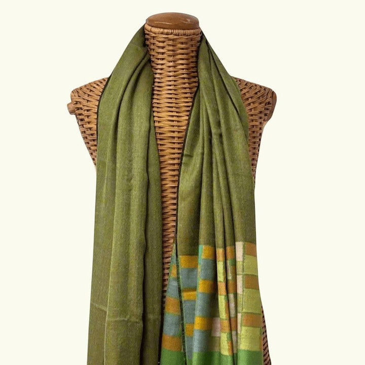 CUBIC Luxury Kani Cashmere Wrap – Draped Lifestyle View of Reversible Green Geometric Pashmina Shawl | Indus Weavers