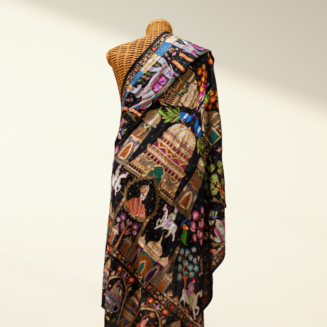 jamawar embroidered pashmina shawl on a mannequin against a plain background 