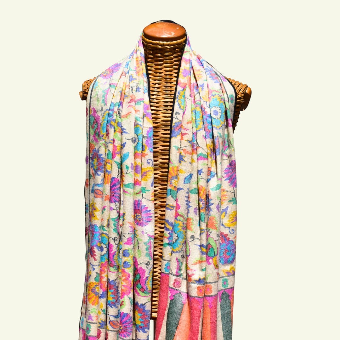 ERIS Kani Pashmina Shawl – Draped Lifestyle View of Ivory Cashmere Wrap Showing Almond Floral Kani Pattern | Indus Weavers