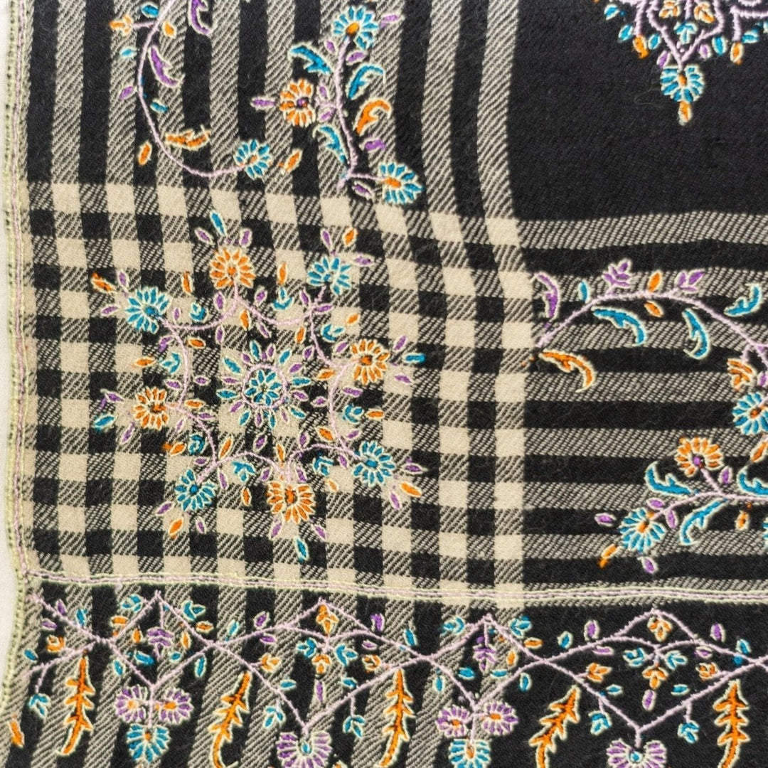 COSMIC Sozni Embroidered Ombré Pashmina – Lifestyle Draped View of 159g Lightweight Cashmere Wrap in Green & Blue | Indus Weavers