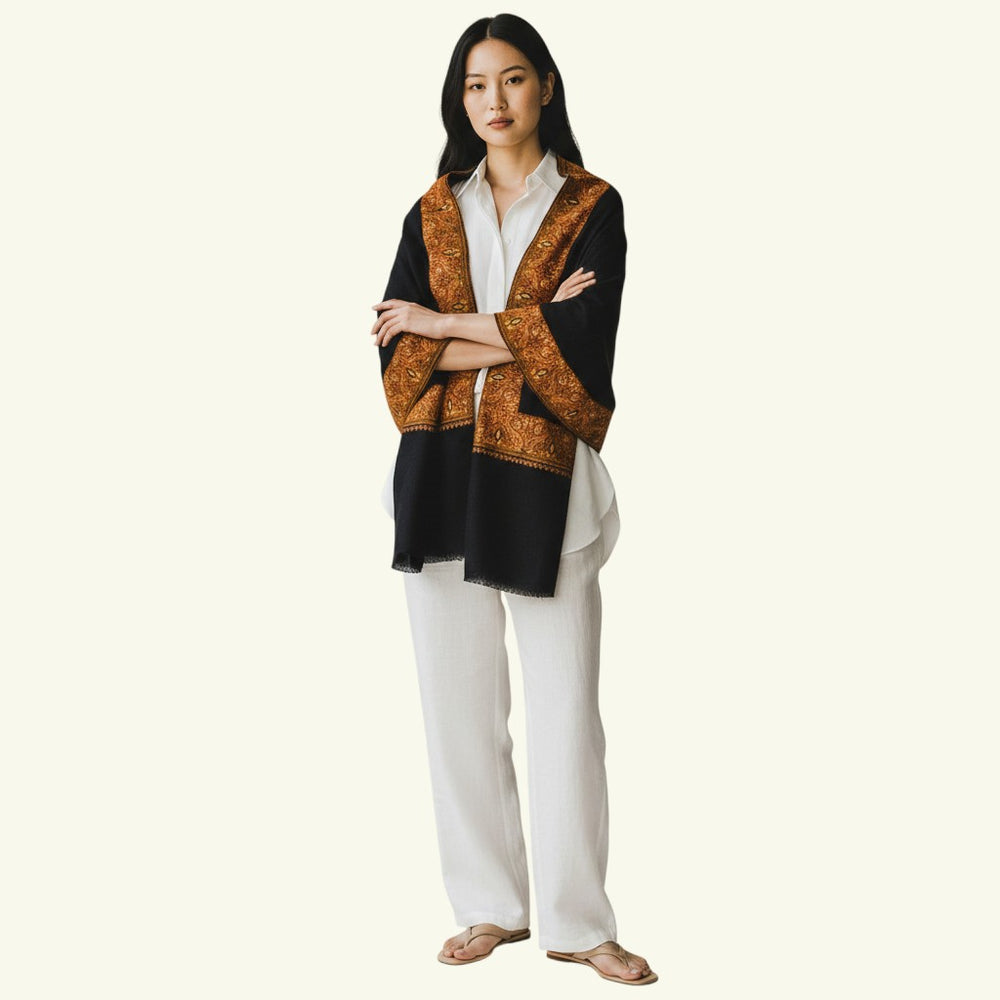 Indus Weavers black Merino cashmere shawl with intricate Sozni embroidery in earthy tones. Handwoven wrap.