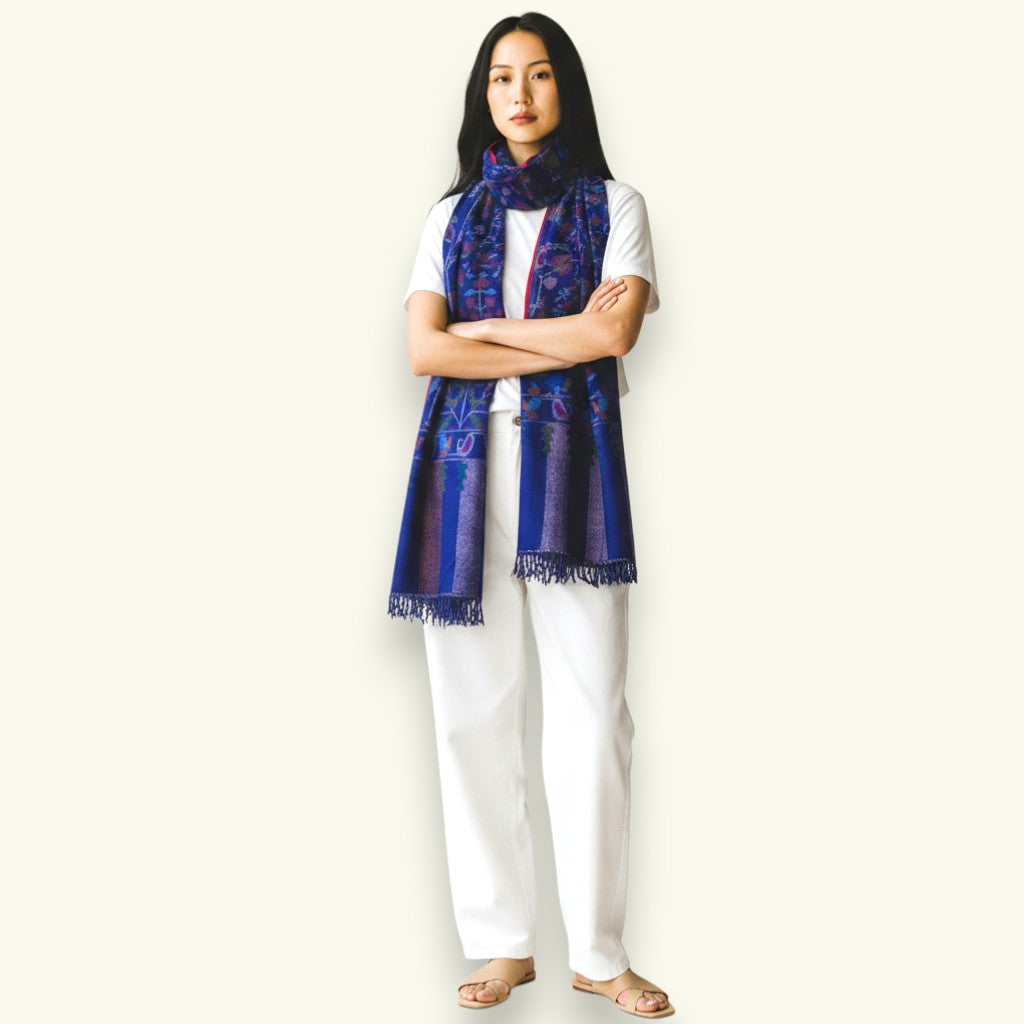 Indus Weavers KAIA blue pure Kashmiri Kani Pashmina shawl with intricate floral motifs and geometric borders.