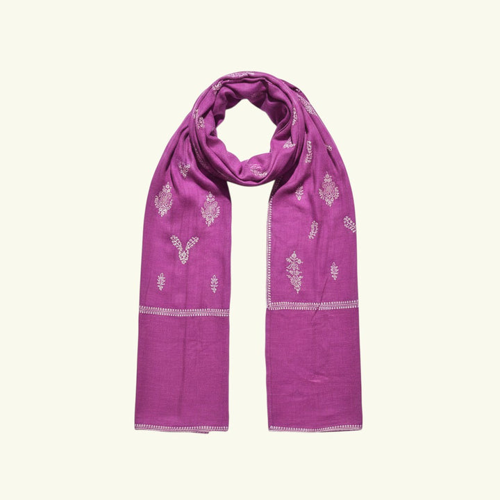Indus Weavers dark pink handwoven pure cashmere Pashmina shawl with intricate white hand embroidery.