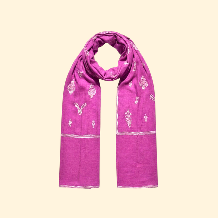Indus Weavers dark pink handwoven pure cashmere Pashmina shawl with intricate white hand embroidery.