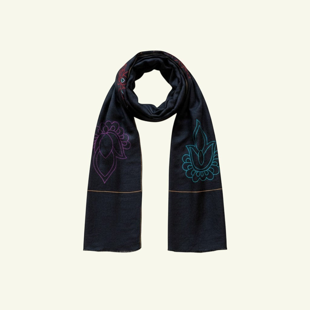 Indus Weavers indigo pashmina scarf with hand-embroidered lotus motifs in purple, teal, and red.