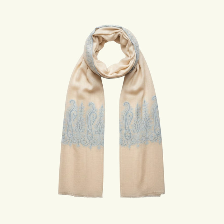 Indus Weavers ivory pure Kashmiri pashmina shawl with blue Sozni embroidered paisley motifs. Handwoven cashmere wrap.