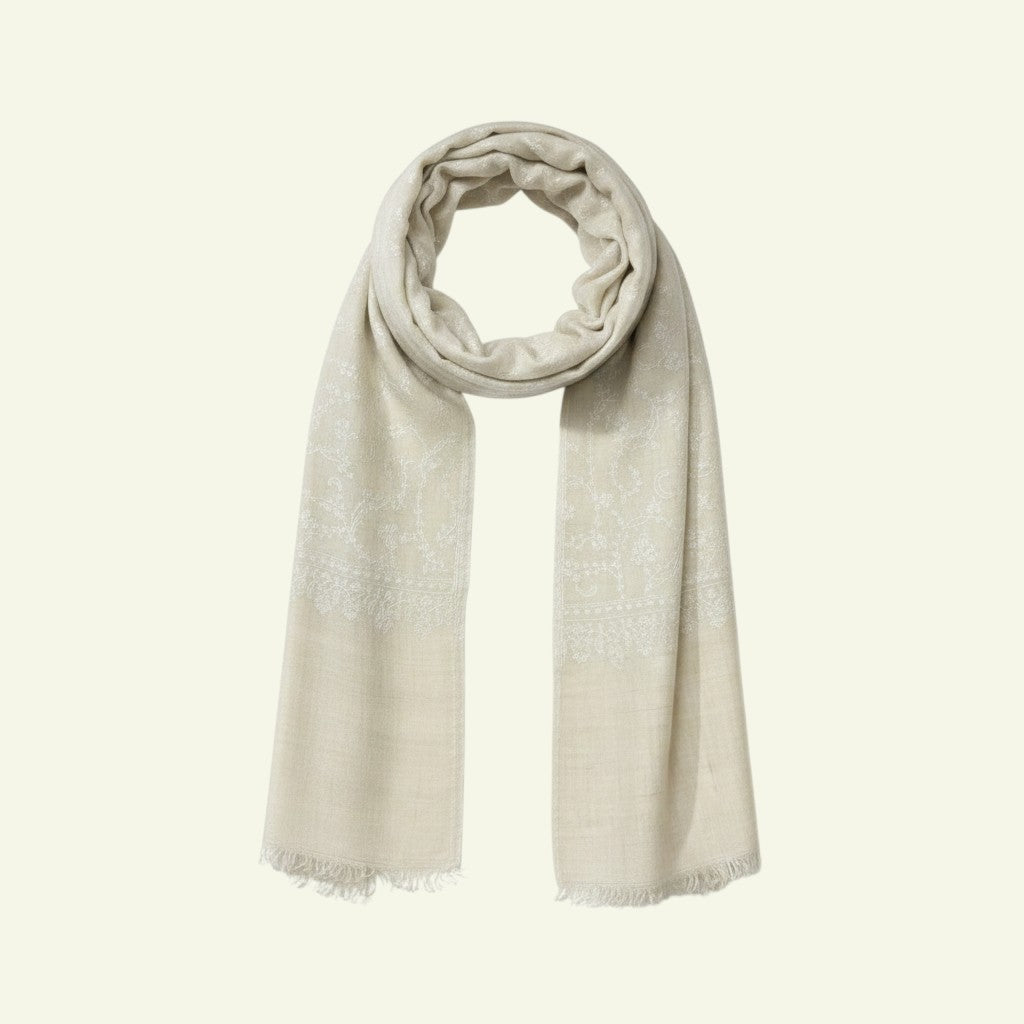 Indus Weavers luxury ivory pure Pashmina shawl with delicate hand-embroidered floral motifs and fringe finish.