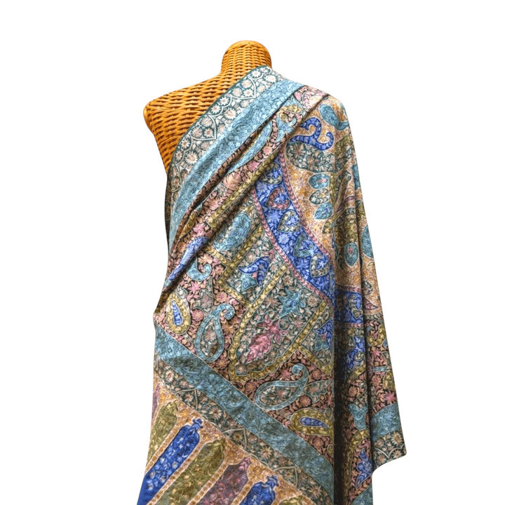 Indus Weavers Regina Pashmina shawl in blue and green with intricate Kalamkari mandala painting and Sozni embroidery.