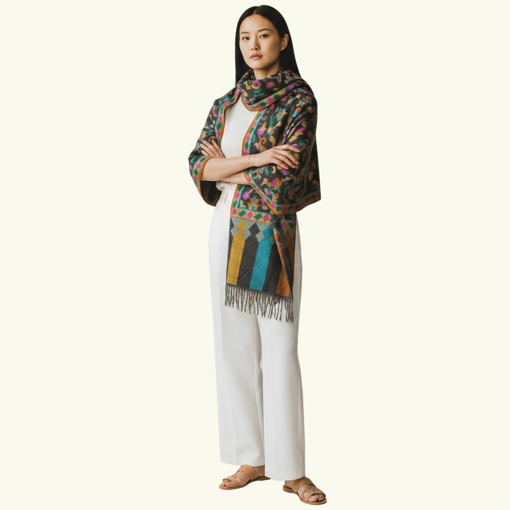 Indus Weavers KARINA greyish black pure Pashmina Kani shawl with multicolour woven motifs and fringed edges.