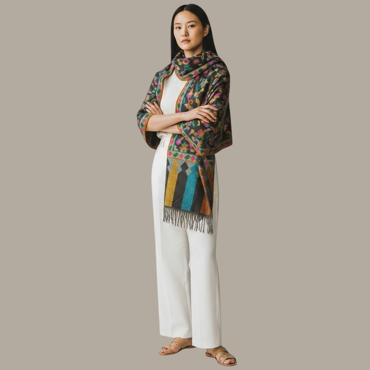 Indus Weavers KARINA greyish black pure Pashmina Kani shawl with multicolour woven motifs and fringed edges.