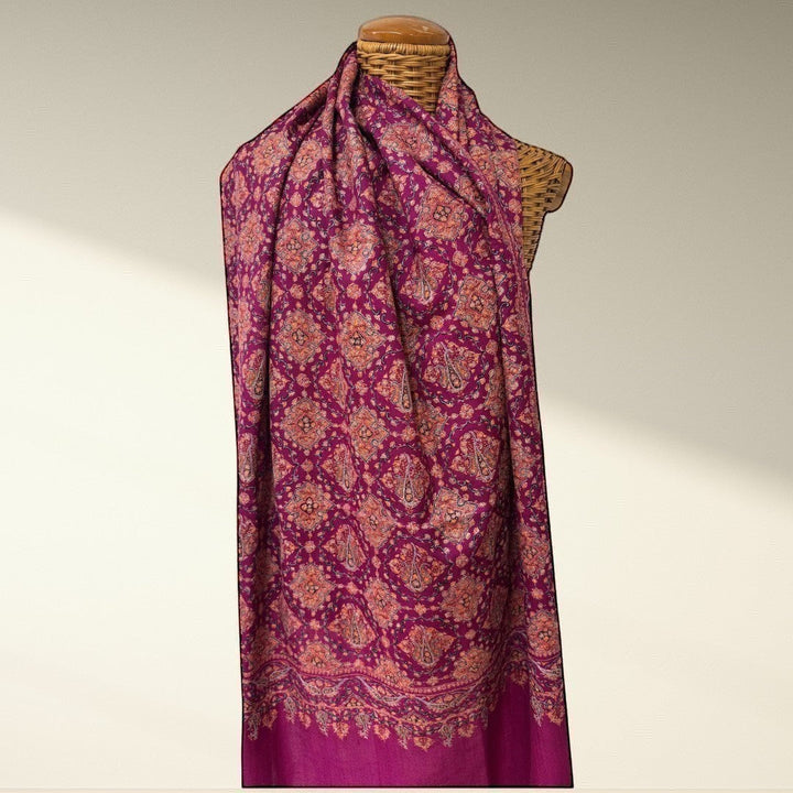 Indus Weavers GULNAR handwoven pure Kashmiri Pashmina shawl in deep magenta with intricate Sozni embroidery in pink and orange.