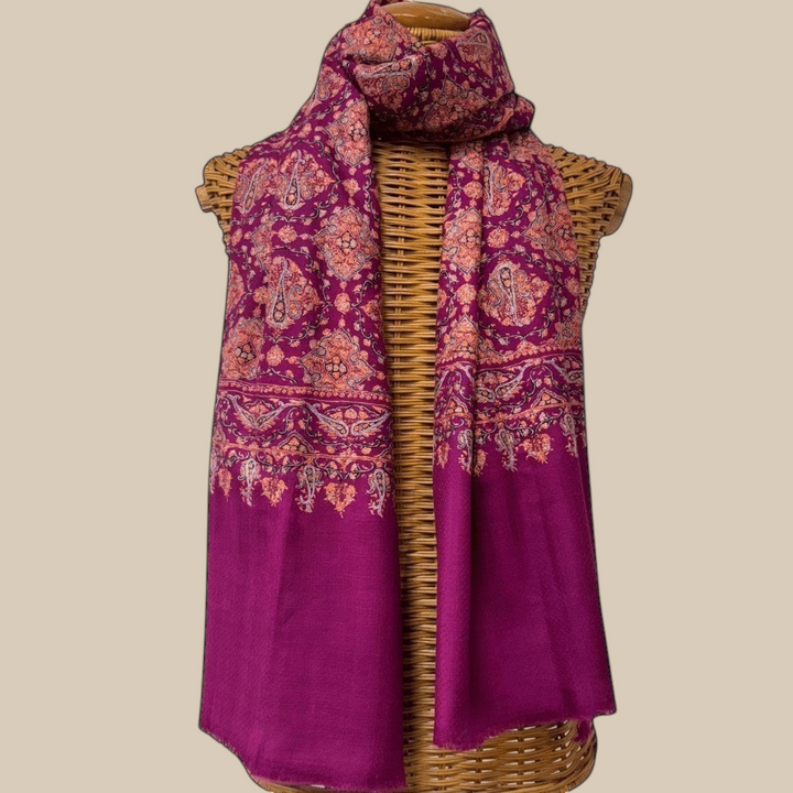 Indus Weavers GULNAR handwoven pure Kashmiri pashmina shawl in deep magenta with intricate paisley and floral Sozni embroidery in pink and orange.
