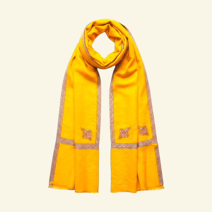 PILA Kashmiri Cashmere Wrap – Detail of Hand-Embroidered Red & Green Sozni Border on Soft Yellow Pashmina | Indus Weavers