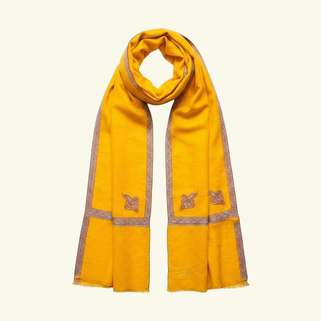 PILA Kashmiri Cashmere Wrap – Detail of Hand-Embroidered Red & Green Sozni Border on Soft Yellow Pashmina | Indus Weavers