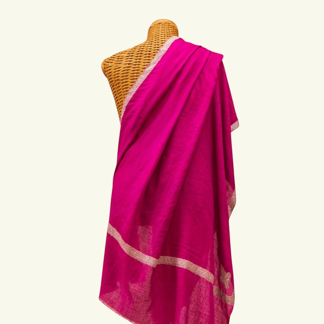 ROZY Handwoven Kashmiri Pashmina – Draped Lifestyle View of Hot Pink Hashidaar Embroidered Cashmere Wrap | Indus Weavers