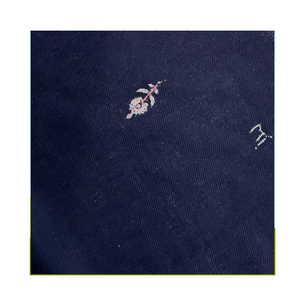 Midnight garden foulard closeup with floral embroidery in white and pink on midnight navy blue pashmina fabric.
