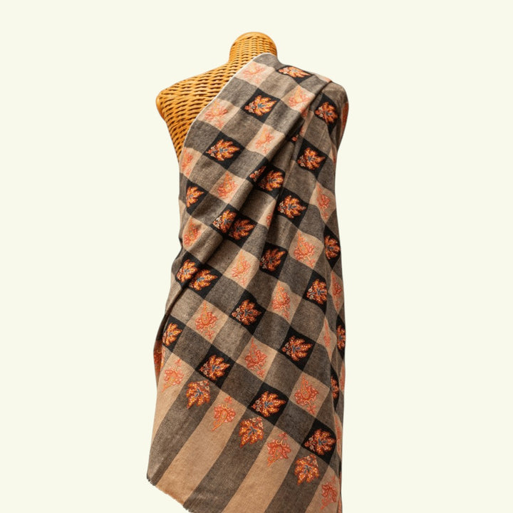 CHLOE Handwoven Kashmiri Pashmina – Lifestyle Draped View of 248g Checkered Cashmere Shawl with Copper-Orange Embroidery | Indus Weavers