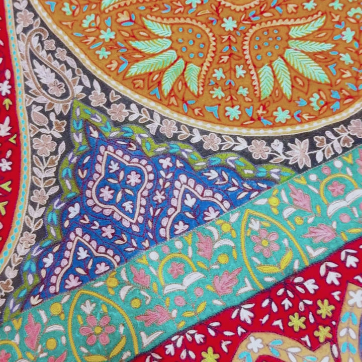 Close up video of pashmina shawl highlighting embroidery