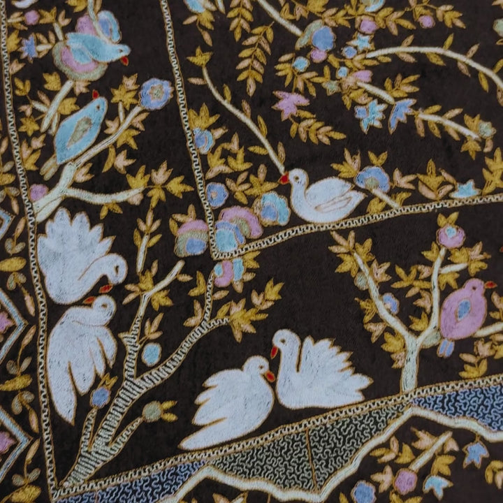 Close up video of pashmina shawl highlighting embroidery